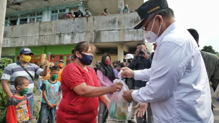 Akhyar Ingatkan Warga Kampung KB Tetap Gunakan Masker